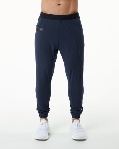 Alphalete Woven 4-Way Stretch 29" Pant Navy | LF2501463