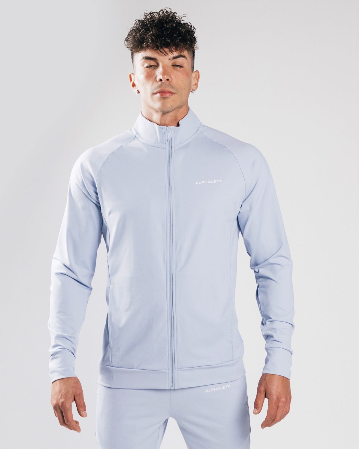 Alphalete 4-Way Stretch Track Jacket Blau | JO1306854