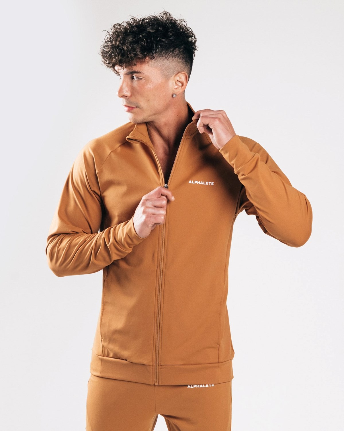 Alphalete 4-Way Stretch Track Jacket Camel | HY5093718