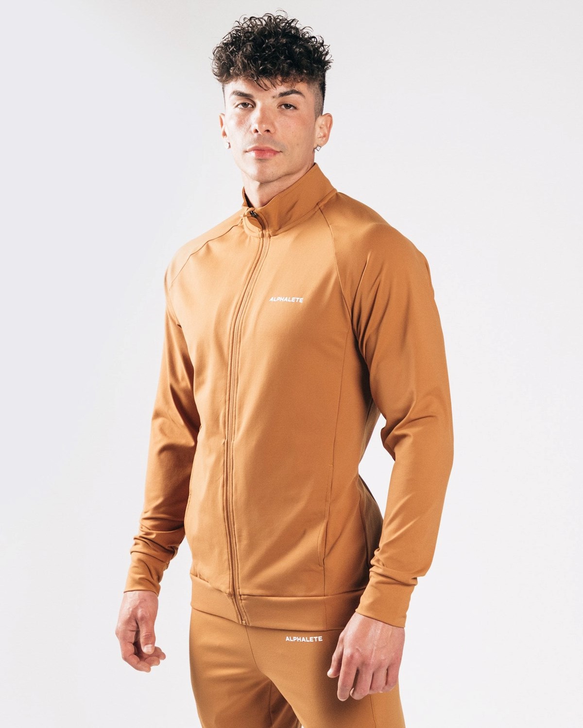 Alphalete 4-Way Stretch Track Jacket Camel | HY5093718