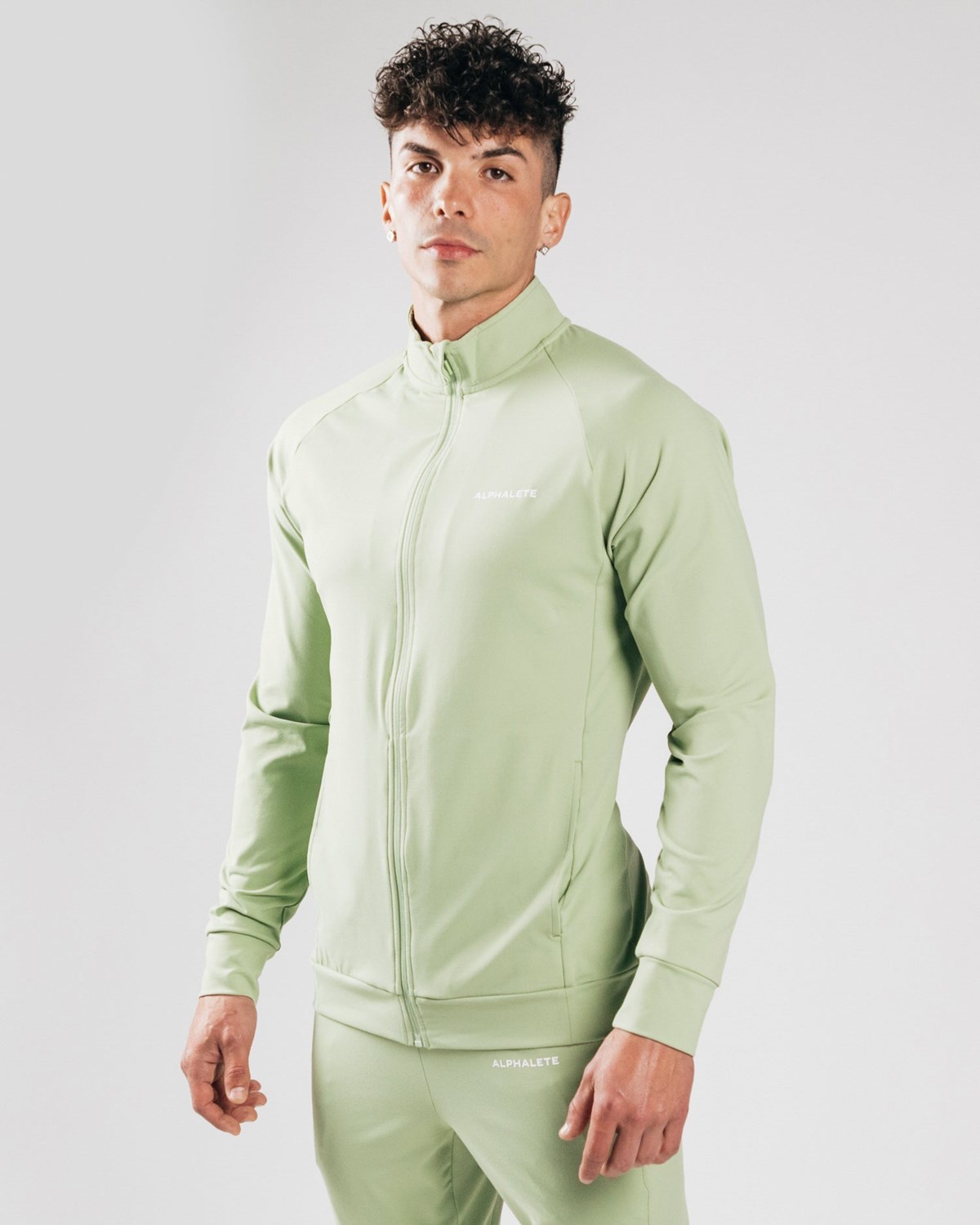 Alphalete 4-Way Stretch Track Jacket Frozen Spring | CD9714352