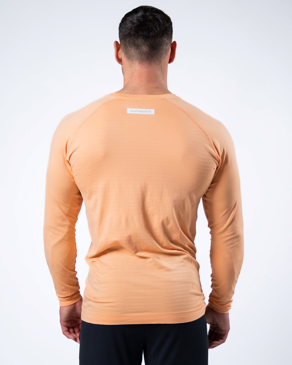 Alphalete High Performance Seamless Long Sleeve Tee Koralle | AY4287306